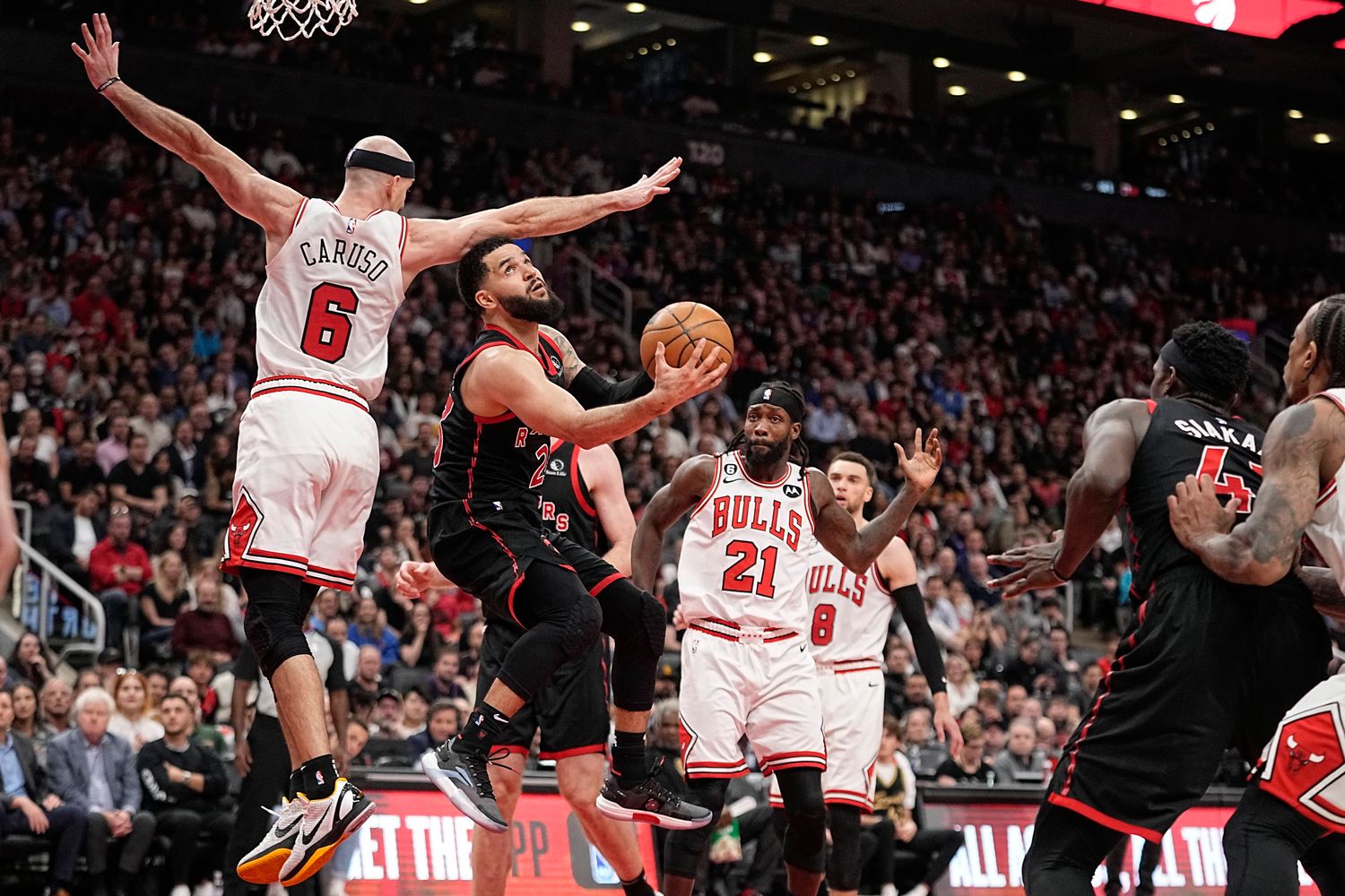 John E. Sokolowski-USA TODAY Sports, Raptors guard Fred VanVleet (23) shoots over Chicago Bulls guard Alex Caruso. 
